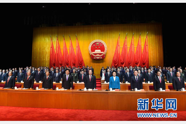 10月1日，慶祝中華人民共和國成立66周年暨新疆維吾爾自治區成立60周年大會在新疆人民會堂隆重舉行。 新華社記者 饒愛民 攝