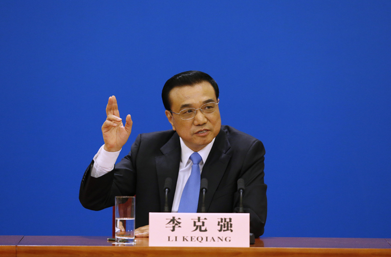 3月15日，國務院總理李克強在北京人民大會堂與中外記者見面，并回答記者提問。 新華社記者 沈伯韓 攝