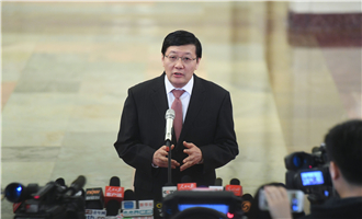 全國社?；鹄硎聲硎麻L樓繼偉接受采訪