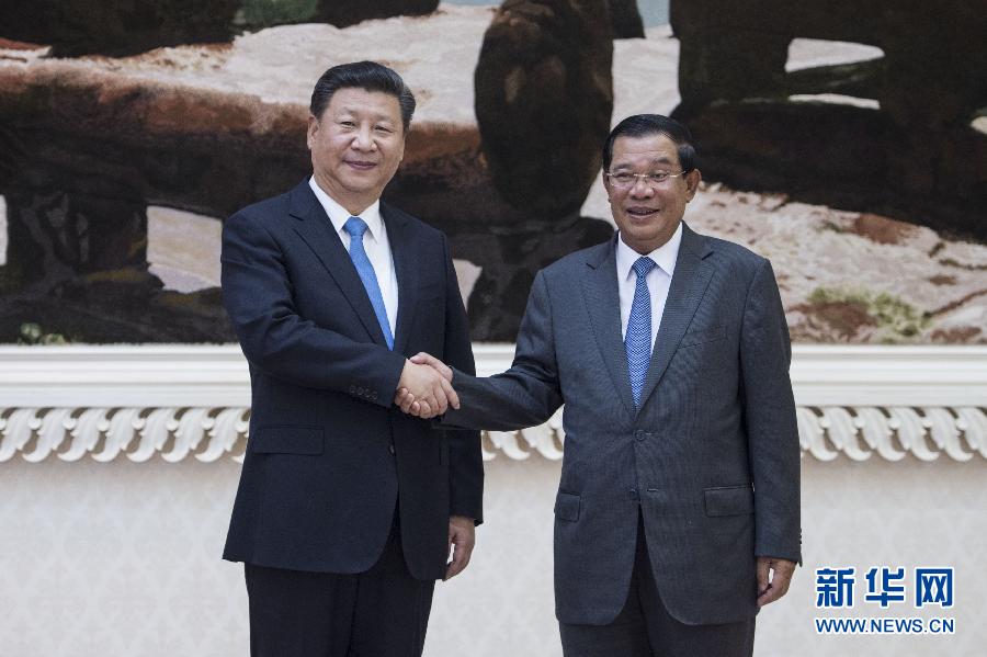 10月13日，國家主席習近平在金邊同柬埔寨首相洪森舉行會談。新華社記者謝環馳攝 