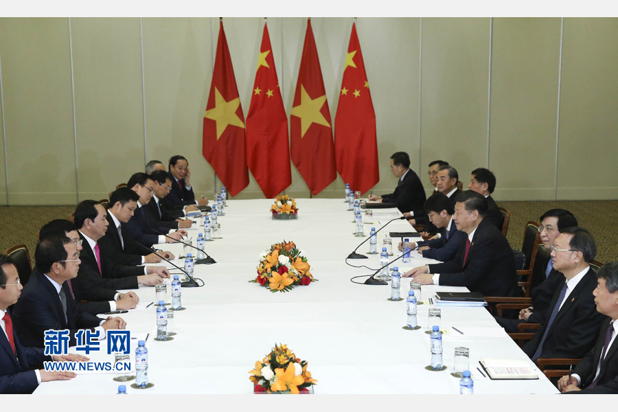 11月19日，國家主席習近平在利馬會見越南國家主席陳大光。新華社記者 龐興雷 攝 